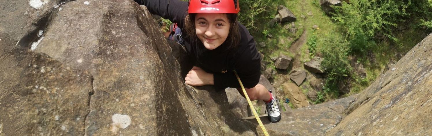 Young girl climbing
